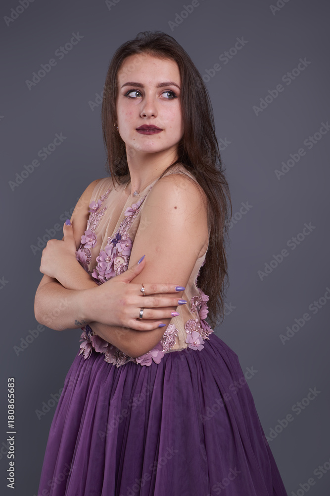 Obraz premium Strong and gentle girl background isolated