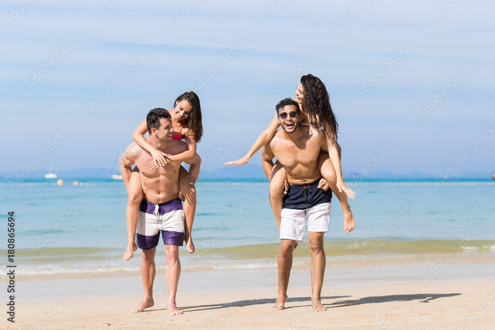 Two Couple On Beach Summer Vacation, Young People Happy Smiling, Man Carry Woman Sea Ocean Holiday Travel