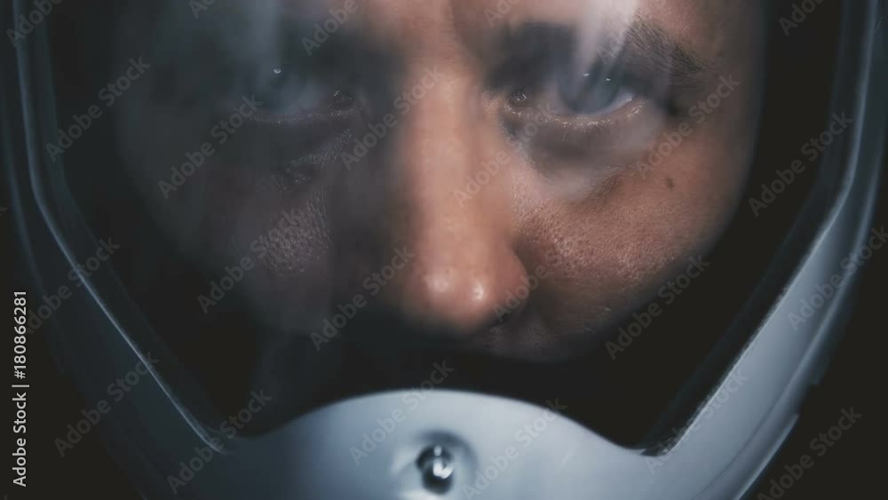 man in protective helmet,suit, close-up,smokescreen man in protective helmet,suit, close-up,smokescreen