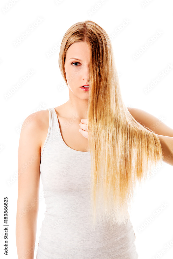 Blond hair. Beautiful woman with straight long hair. Blond hair. Beautiful woman with straight long hair.
