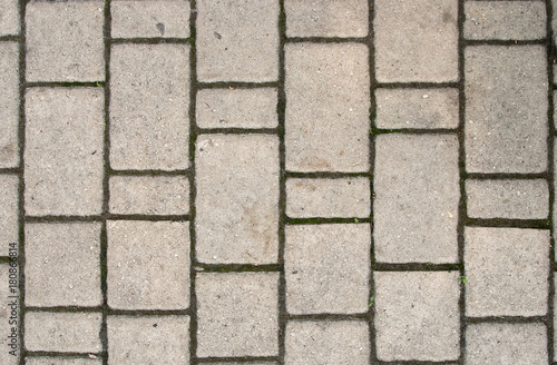 Background of light gray rectangular sidewalk stone