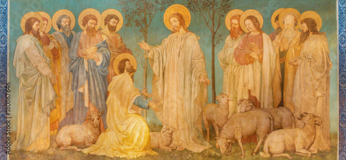 LONDON, GREAT BRITAIN - SEPTEMBER 19, 2017: The fresco of scene ‘Feed my sheep’ - Jesus give the power to St. Peter in church St. Mary Abbots by John Clayton jnr. (end of 19. cent.)