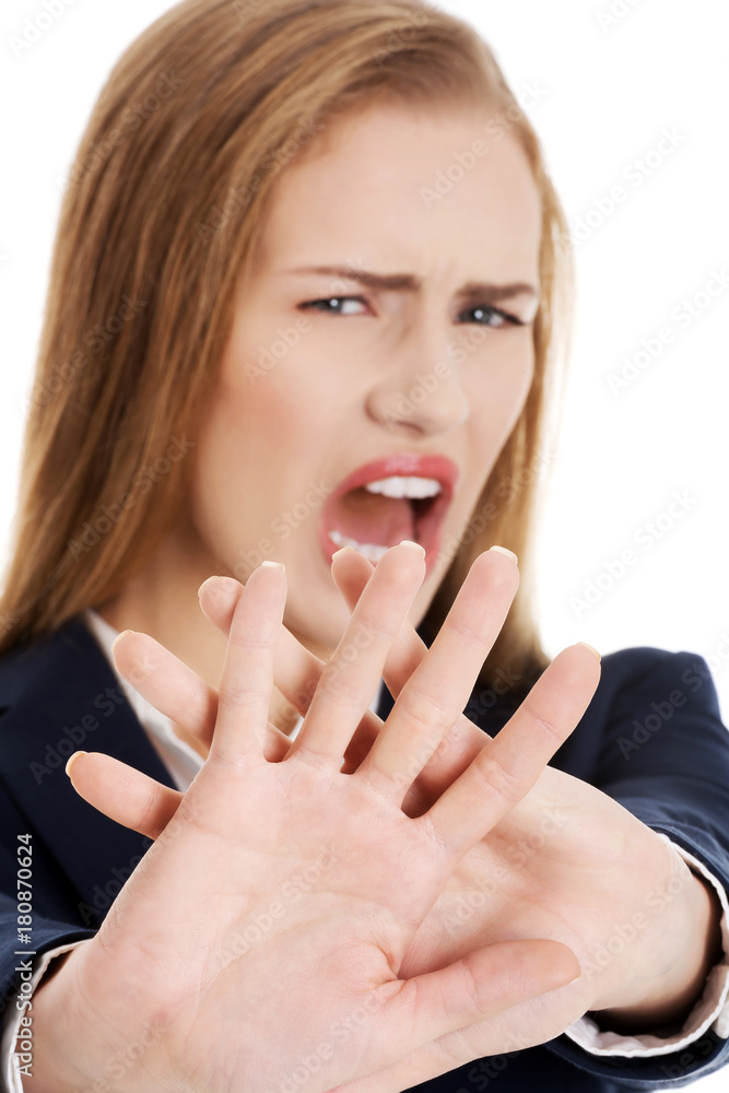 Beautiful caucasian business woman shows rejection and screams. Beautiful caucasian business woman shows rejection and screams.