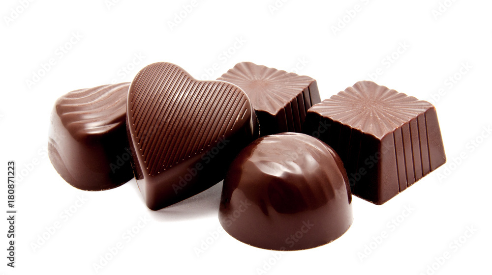 Assortment of chocolate candies sweets isolated on a white Assortment of chocolate candies sweets isolated on a white