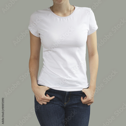 Young beautiful sexy female with blank white shirt, front. Ready for your design or artwork.