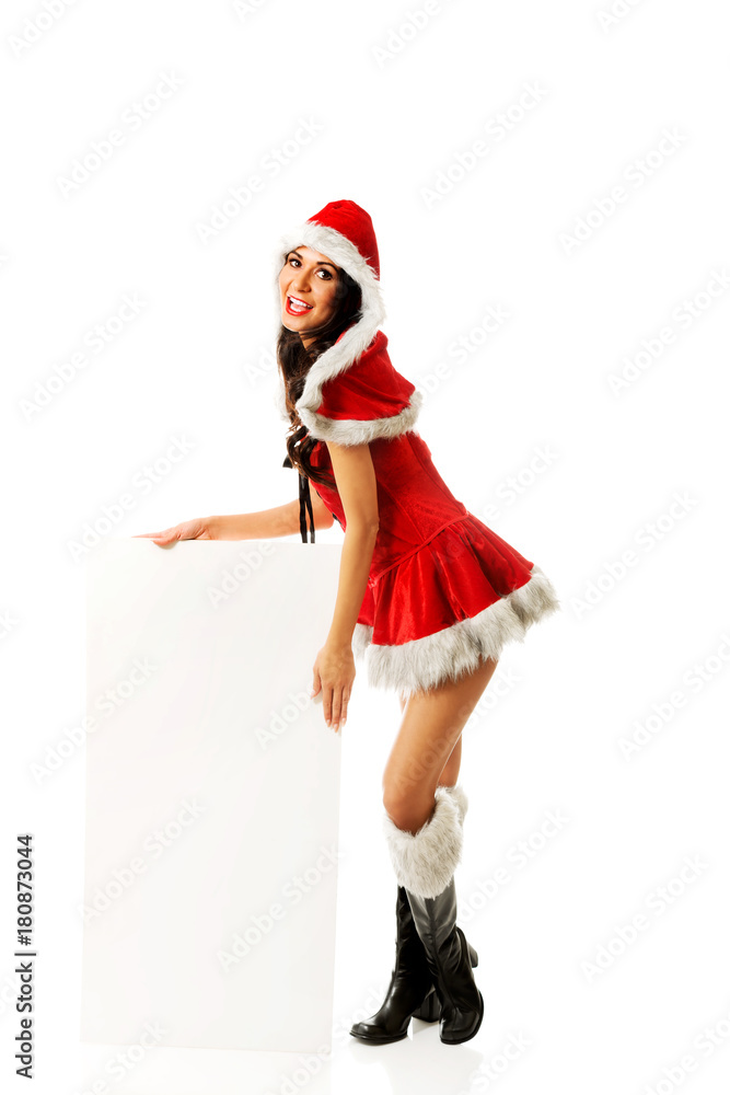 Santa woman holding white empty banner Santa woman holding white empty banner