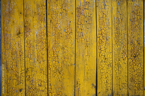 background of old yellow painted wooden planks
