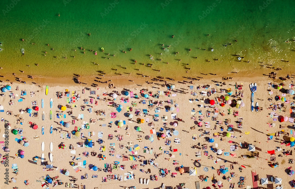 Aerial Summer View Of People Crowd Having Fun On Cascais Beach In Portugal Aerial Summer View Of People Crowd Having Fun On Cascais Beach In Portugal