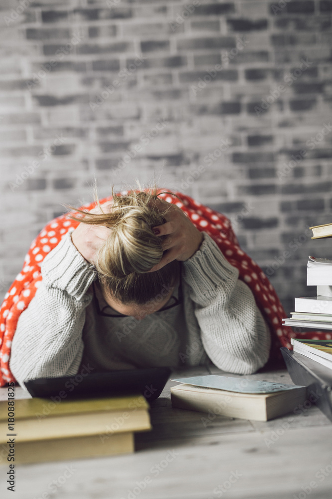 Tired young woman from all the reading Tired young woman from all the reading