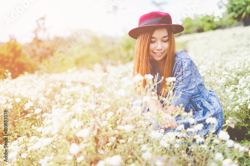 Portrait of Happy Asian woman smiling in The Chrysanthemum garden