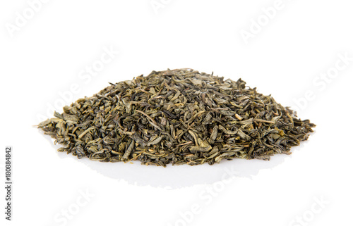 Fragrant pile of dry green tea isolated on white