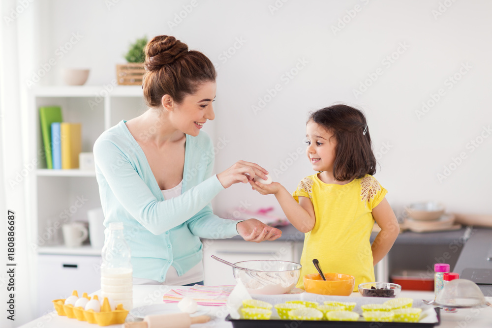 happy mother and daughter baking at home happy mother and daughter baking at home