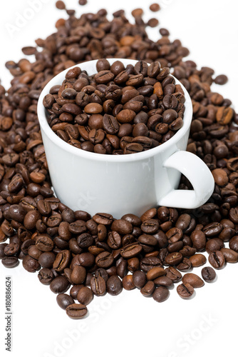 cup with coffee beans on white background, vertical