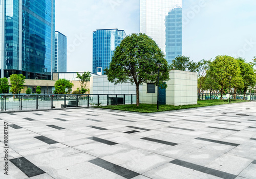 Panoramic skyline and buildings with empty concrete square floor © onlyyouqj