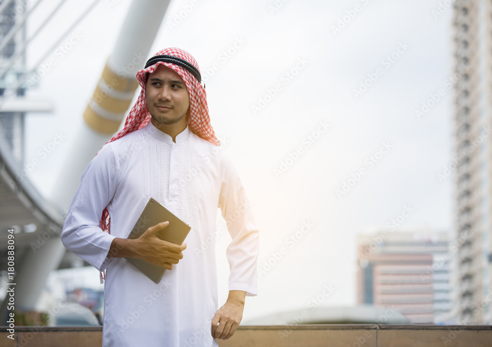 Arabian arab businessman standing hold Tablet computer Arabian arab businessman standing hold Tablet computer