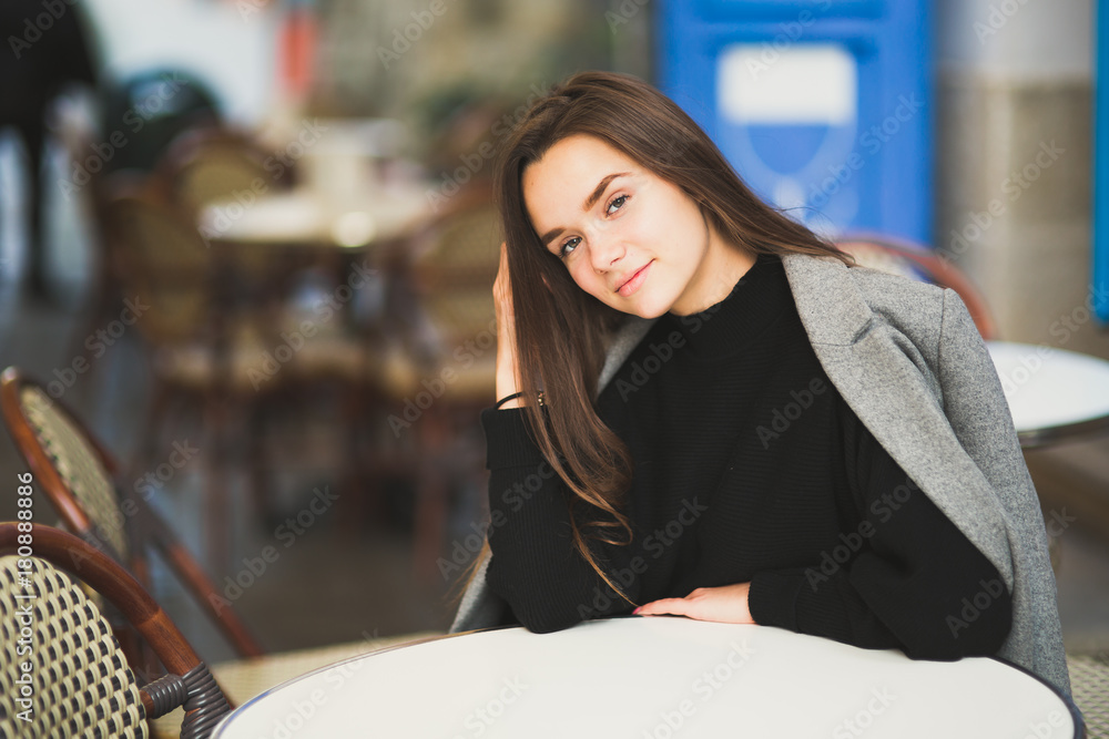 Portrait of a young beautiful woman in a urban background Portrait of a young beautiful woman in a urban background