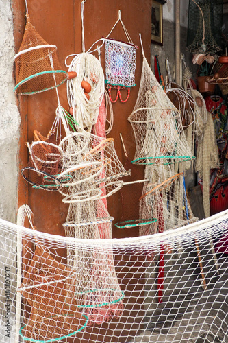 Fishing nets in Cefalu`s streets, Sicily photo