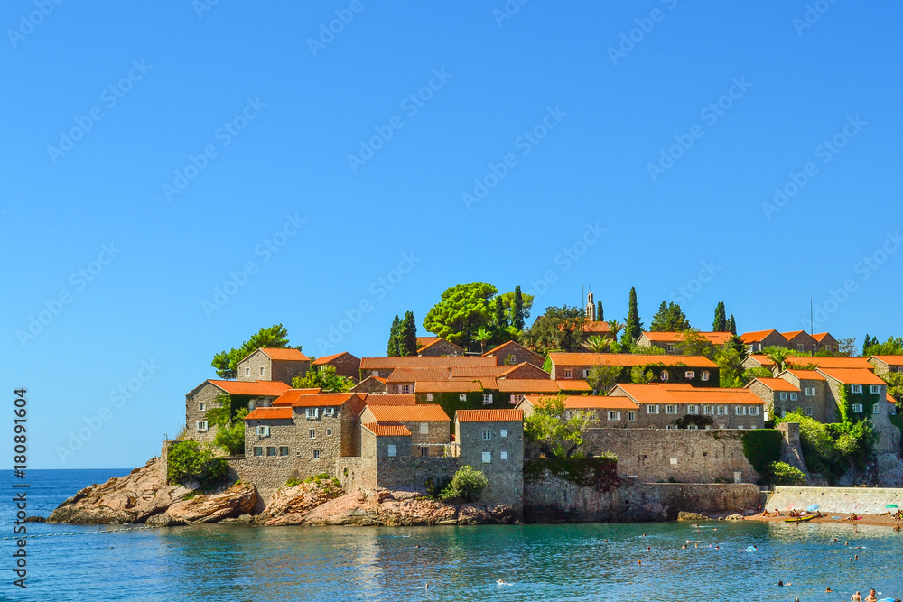 Saint Stephen's Island, Montenegro 14 september 2017: Sveti Stefan (St. Stefan) island in Adriatic sea, Montenegro - obrazy, fototapety, plakaty 