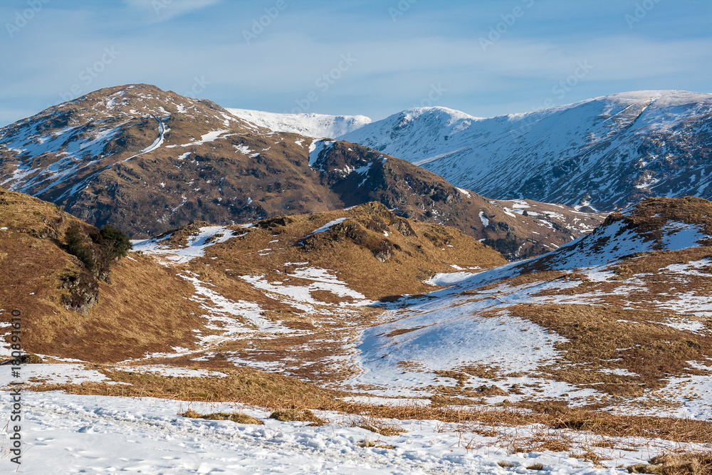 View of Snow covered mountains from Loughrigg in Lake District