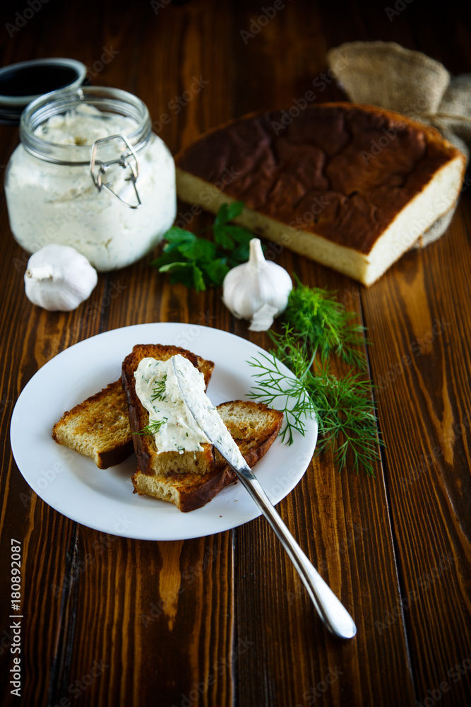 Sandwich of fried toasts with garlic melted cheese Sandwich of fried toasts with garlic melted cheese