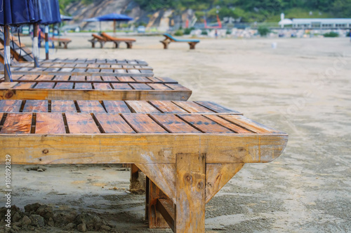 Beach wooden chair on the s...