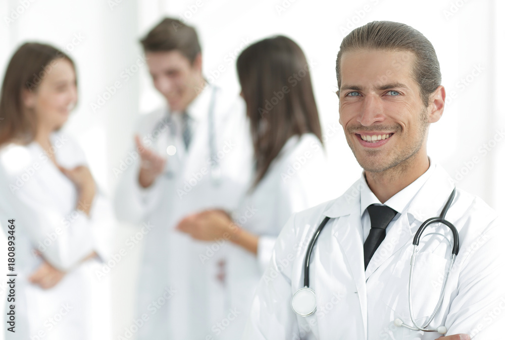 smiling doctor therapist on blurred background. smiling doctor therapist on blurred background.
