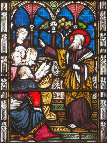 LONDON, GREAT BRITAIN - SEPTEMBER 19, 2017: The sermon of St. Paul in synagogue on the stained glass in St Mary Abbot's church on Kensington High Street.