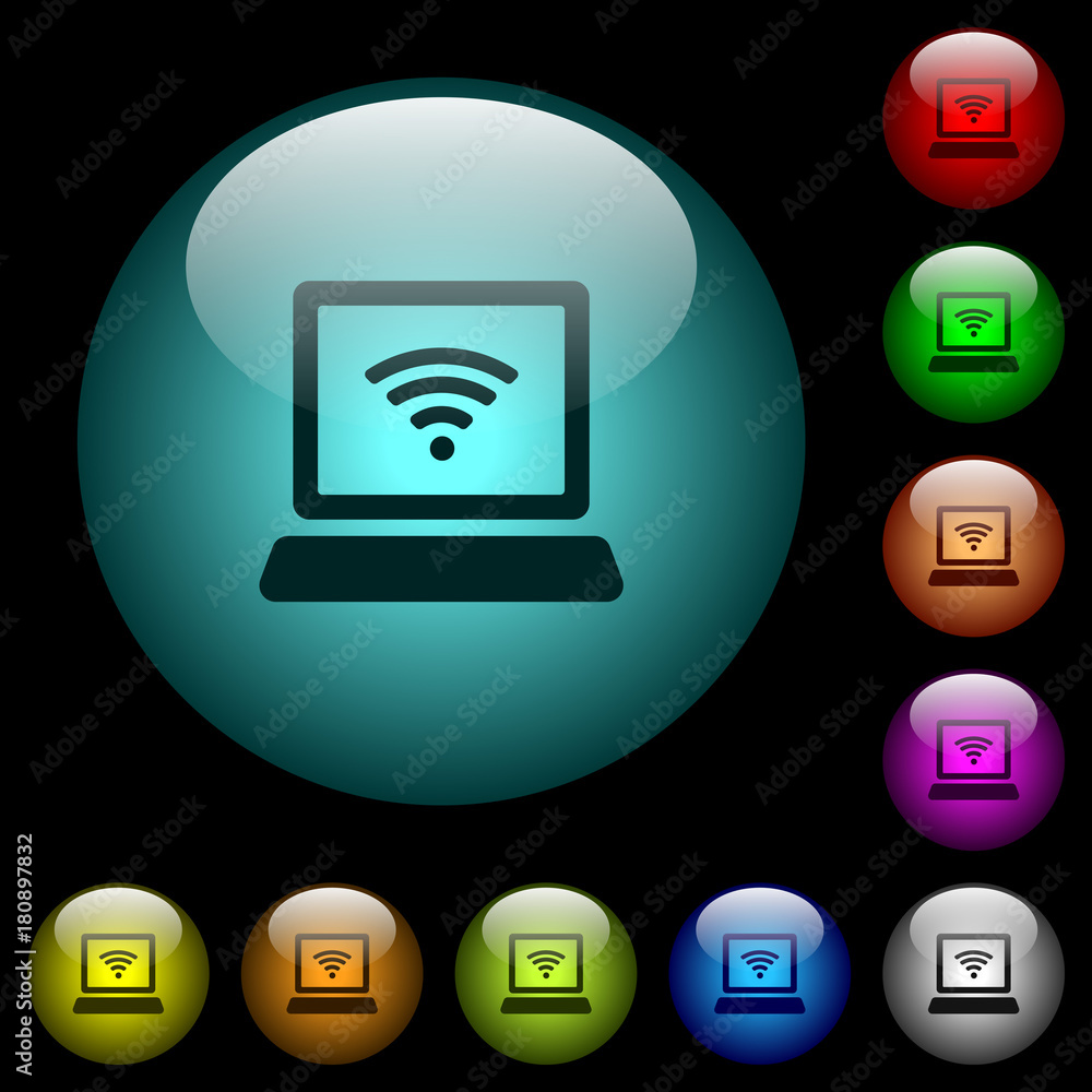 Laptop computer with wireless symbol icons in color illuminated glass buttons Laptop computer with wireless symbol icons in color illuminated glass buttons