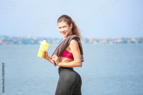 Beautiful young woman with ...