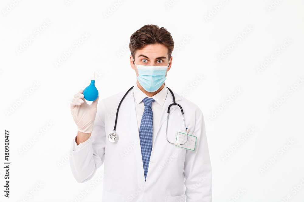 Close up portrait of a shocked young male doctor Close up portrait of a shocked young male doctor
