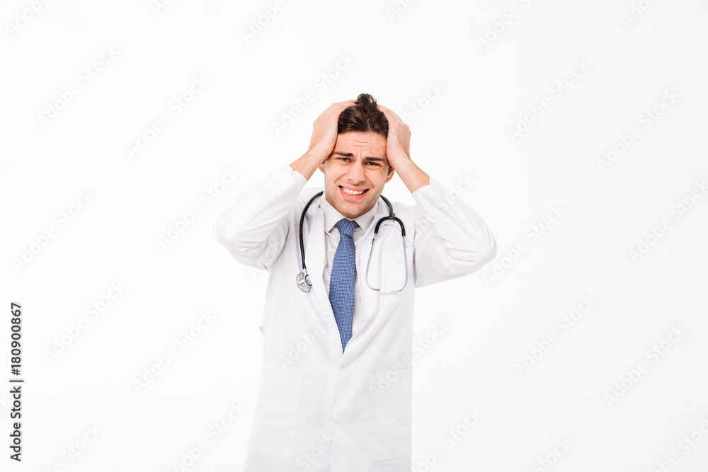 Portrait of a frustrated young male doctor Portrait of a frustrated young male doctor
