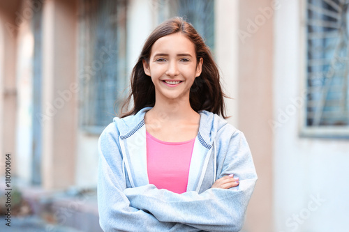 Attractive teenage girl out...