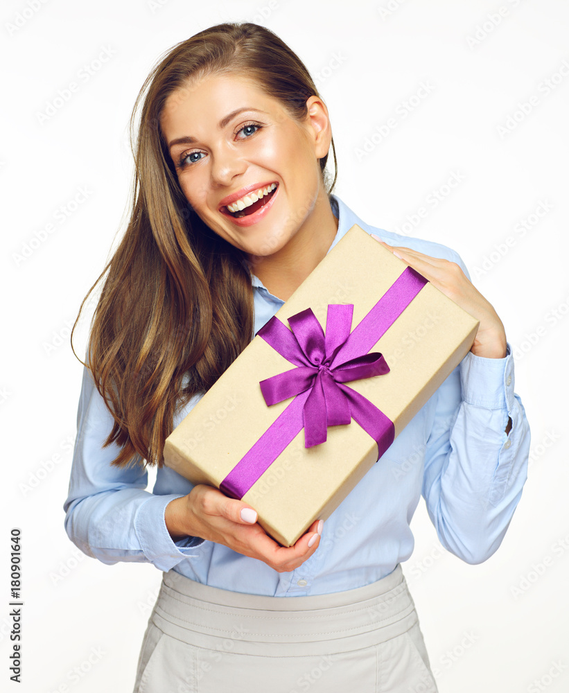 Young smiling business woman holding gift box. Young smiling business woman holding gift box.