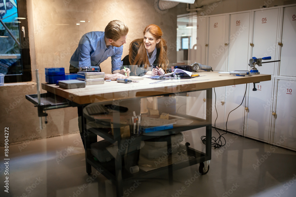 Obraz premium People working in modern beautiful workshop