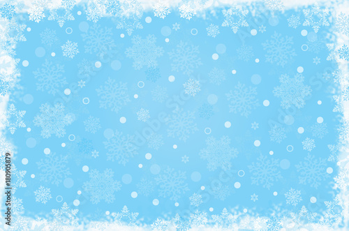 Белые снежинки на голубом фоне.