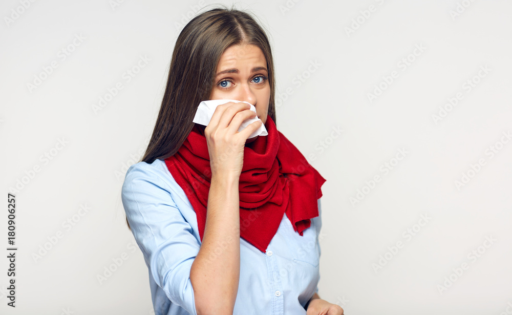 Sickness woman blowing his nose in paper tissue. Sickness woman blowing his nose in paper tissue.