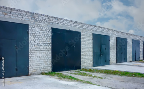 row of black garages photo