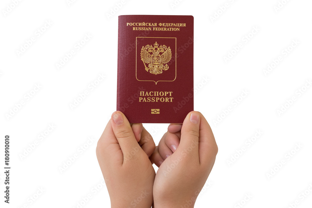 Russian foreign passport in the hands. Isolated on white background. Russian foreign passport in the hands. Isolated on white background.