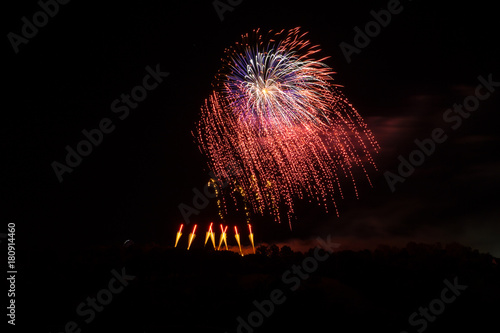 Giant bright exploding fireworks at huge celebration photo