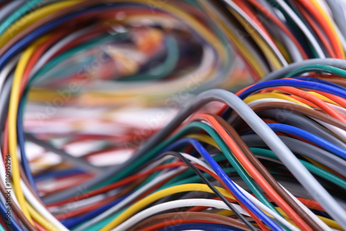Colorful electric computer cable closeup with selective focus