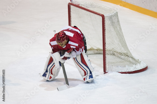 Photography goal keeper concentration during hockey game