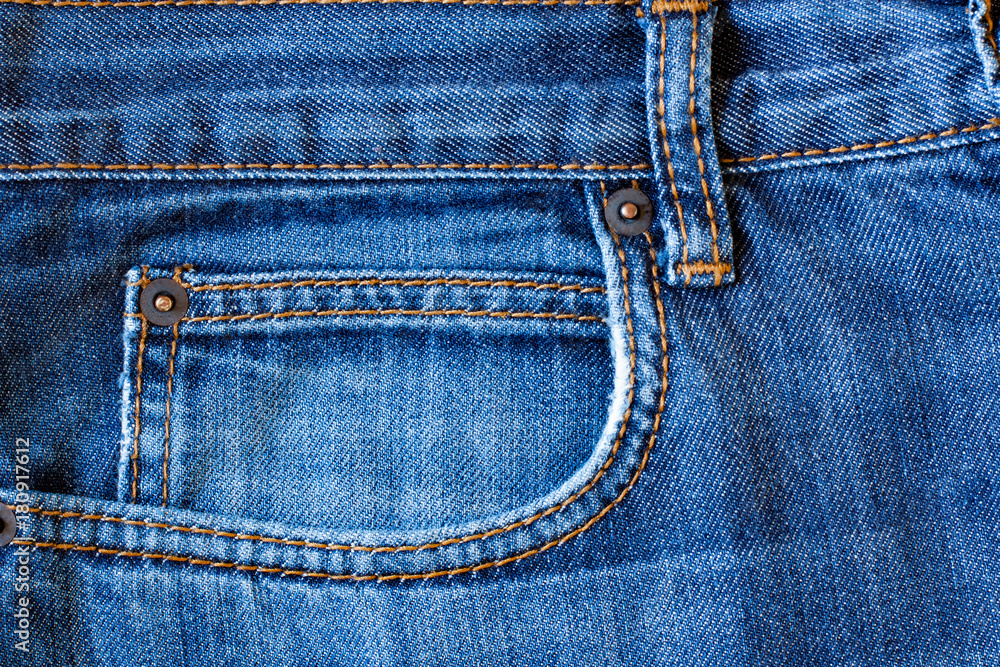 Pocket Of Blue Jeans With Seams Background Texture Close Up. Pocket Of Blue Jeans With Seams Background Texture Close Up.