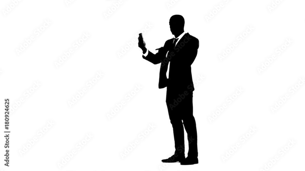 Man speaks by video call on the phone White background. Silhouette