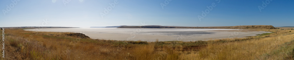 The dried salty lake. The water in the lake is pink. Panorama