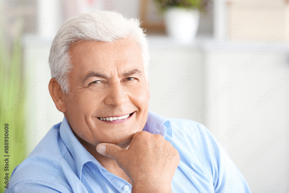 Handsome mature man at home Handsome mature man at home