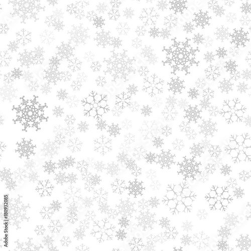 Festive Christmas background of snowflakes. For postcards, poster, invitation design for new year. Seamless pattern.