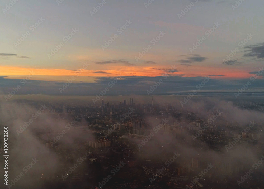 Aerial view. City view in the morning with clouds.