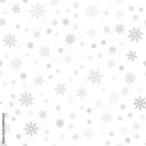 Seamless pattern. Christmas abstract background made of snowflakes on white. Design postcards  posters  greeting for the new year.