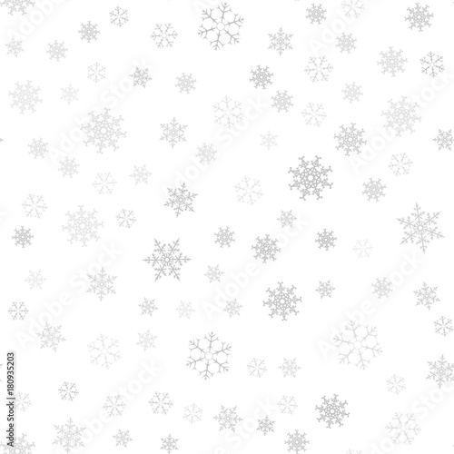 Seamless pattern. Christmas abstract background made of snowflakes on white. Design postcards, posters, greeting for the new year.