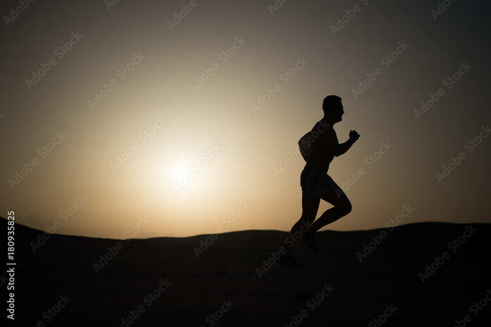 running man silhouette at sunset sky running man silhouette at sunset sky